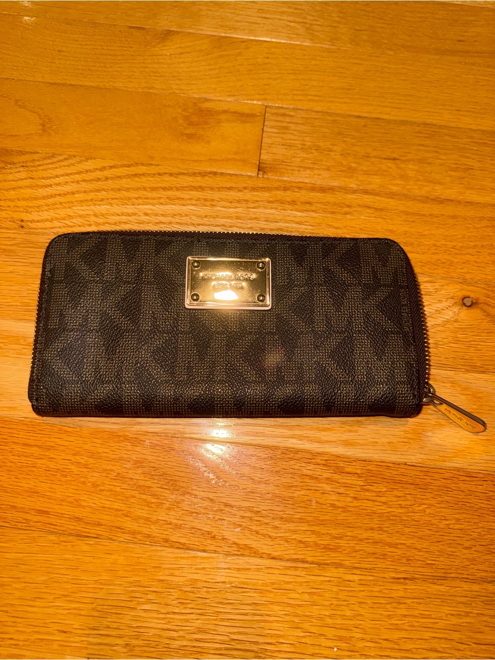 Michael Kors Black Signature Zip Around Wallet with Gold Plaque